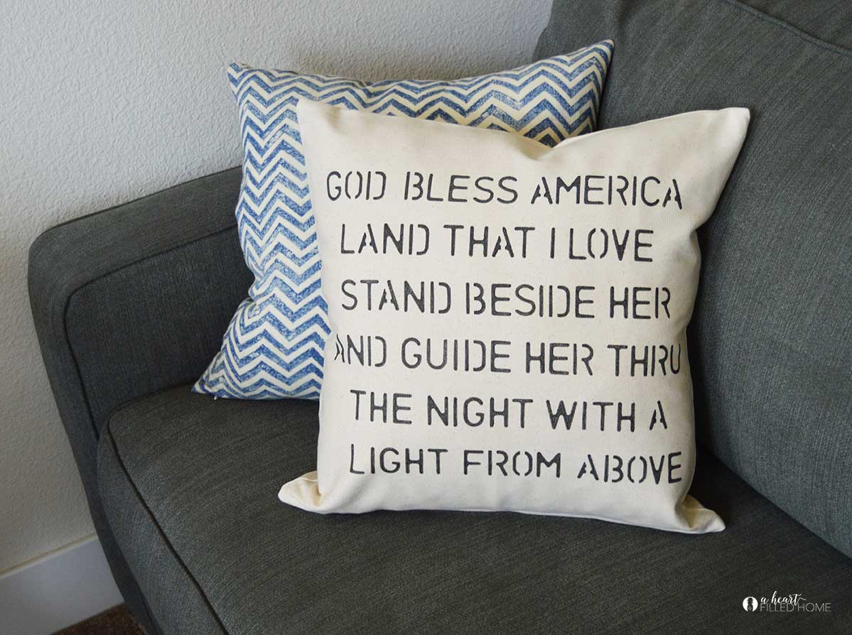 Create your own DIY Stenciled Patriotic Pillow Cover with this easy tutorial!