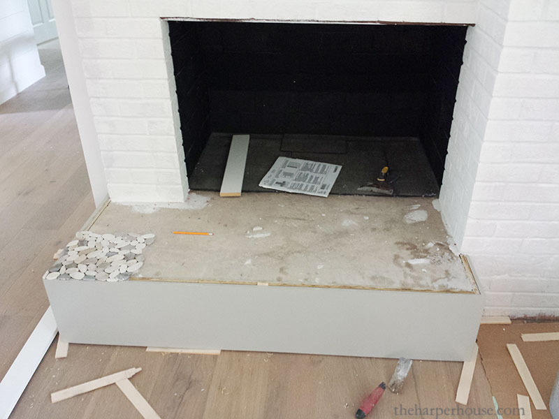 Brick Fireplace Makeover You Won T, How To Put Stone Tile Over Brick Fireplace
