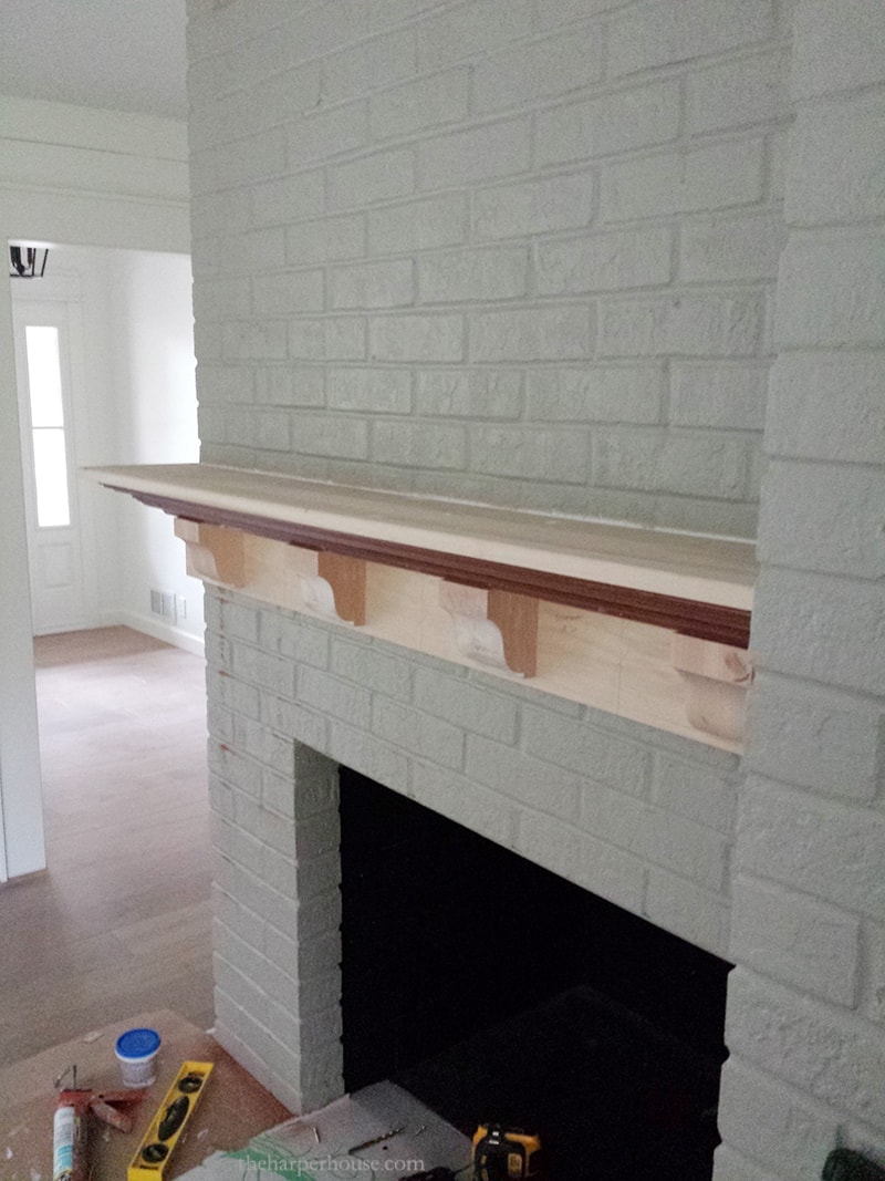 building a fireplace mantel with crown molding and corbels